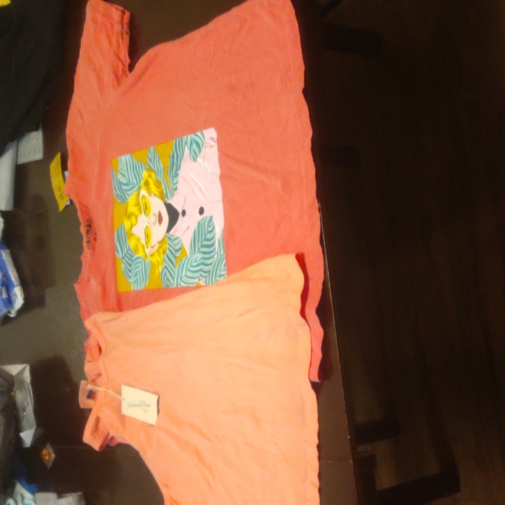 Two new with tag tops size medium